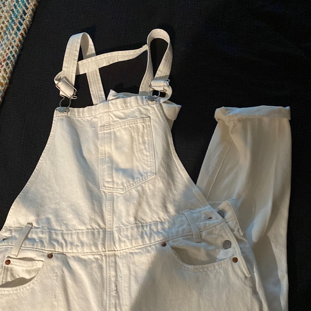 Woman’s white overalls